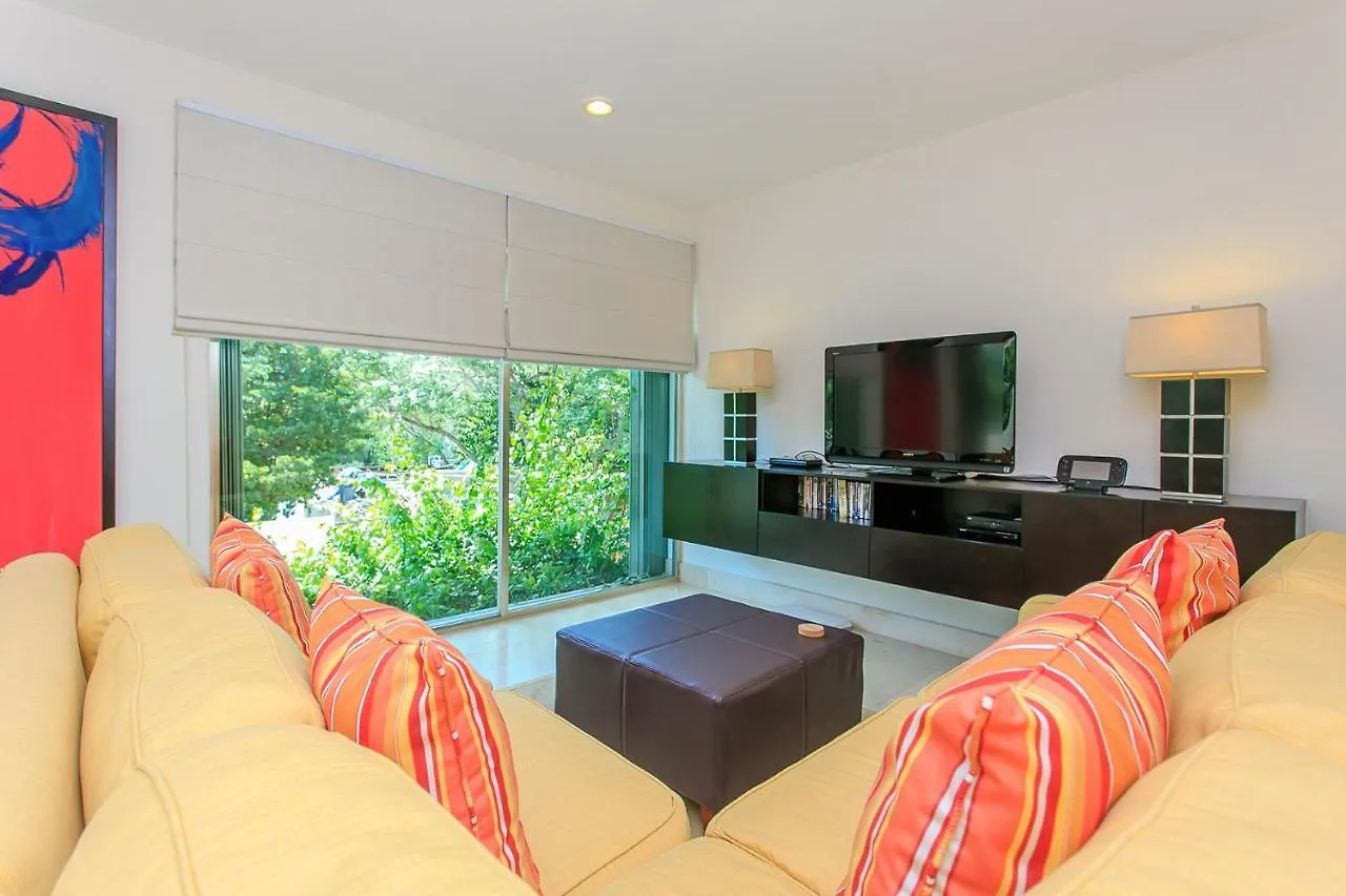 3-Level Condo With A Private Balcony & Rooftop Lounge Playa del Carmen